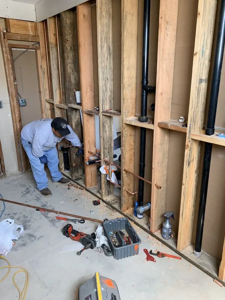 Commercial rough-in plumbing for Water Heater Replacement in Windsor at Peachtree